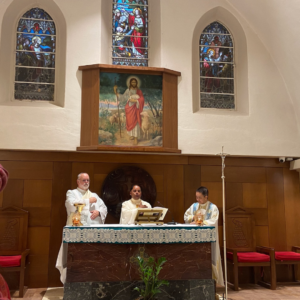 Three priests celebrating mass during Holy Land Pilgrimage