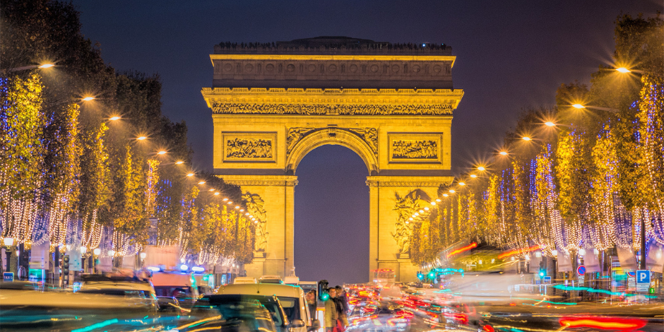 Go up the Arc de Triomphe and see Eiffel Tower